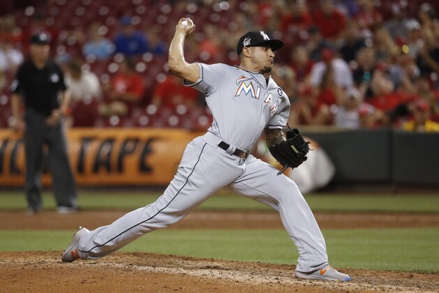 Miami Marlins relief pitcher AJ Ramos throws in the ninth inning of a baseball game against the Cincinnati Reds, Friday, July 21, 2017, in Cincinnati. The Marlins won 3-1. (AP Photo/John Minchillo)