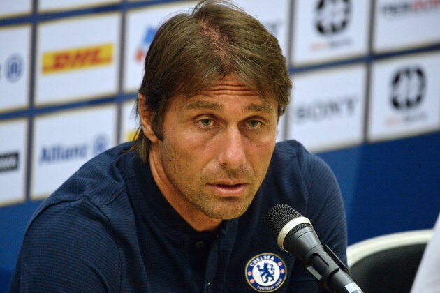 Chelsea coach Antonio Conte attends a pre-match press conference in Singapore on July 24, 2017, ahead of the International Champions Cup football match between Bayern Munich and Chelsea on July 25.  / AFP PHOTO / ROSLAN RAHMAN        (Photo credit should read ROSLAN RAHMAN/AFP/Getty Images)