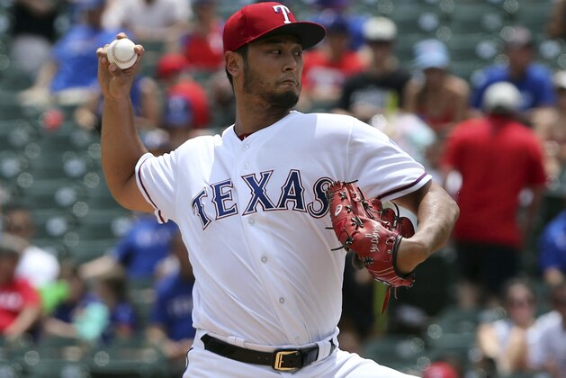 Texas Rangers starting pitcher Yu Darvish works the second inning of a baseball game against the Los Angeles Angels in Arlington, Texas, Sunday, July 9, 2017.(AP Photo/ Richard W. Rodriguez)