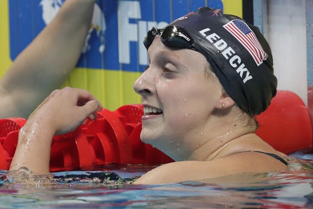 United States' Katie Ledecky celebrates after winning the gold medal in the women's 400-meter freestyle final during the swimming competitions of the World Aquatics Championships in Budapest, Hungary, Sunday, July 23, 2017. (AP Photo/Michael Sohn) United States' Katie Ledecky celebrates after winning the gold medal in the women's 400-meter freestyle final during the swimming competitions of the World Aquatics Championships in Budapest, Hungary, Sunday, July 23, 2017. (AP Photo/Michael Sohn)