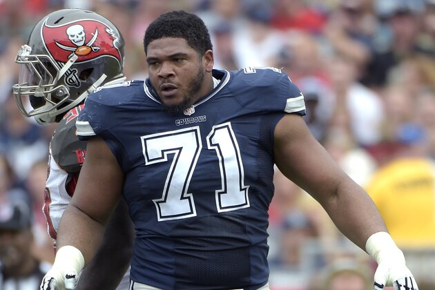Dallas Cowboys offensive guard La'el Collins (71) searches for his helmet after it was knocked off during the first half of an NFL football game against the Tampa Bay Buccaneers in Tampa, Fla., Sunday, Nov. 15, 2015. (AP Photo/Phelan M. Ebenhack) Dallas Cowboys offensive guard La'el Collins (71) searches for his helmet after it was knocked off during the first half of an NFL football game against the Tampa Bay Buccaneers in Tampa, Fla., Sunday, Nov. 15, 2015. (AP Photo/Phelan M. Ebenhack)