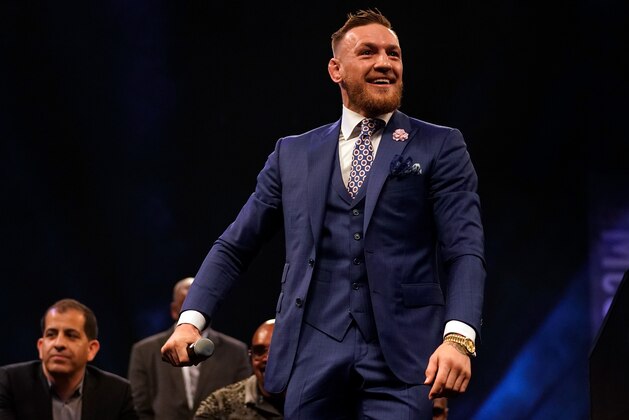 LONDON, ENGLAND - JULY 14:  Conor McGregor reacts to the crowd during the Floyd Mayweather Jr. v Conor McGregor World Press Tour event at SSE Arena on July 14, 2017 in London, England. (Photo by Jeff Bottari/Zuffa LLC/Zuffa LLC via Getty Images)