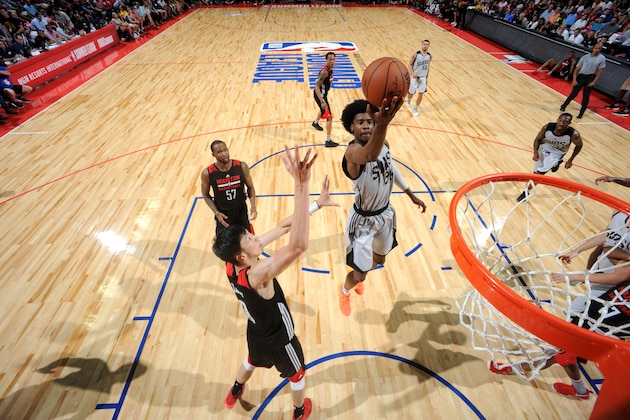 LAS VEGAS, NV - JULY 10:  Josh Jackson #99 of the Phoenix Suns goes to the basket against the Houston Rockets on July 10, 2017 at the Thomas & Mack Center in Las Vegas, Nevada. NOTE TO USER: User expressly acknowledges and agrees that, by downloading and or using this Photograph, user is consenting to the terms and conditions of the Getty Images License Agreement. Mandatory Copyright Notice: Copyright 2017 NBAE (Photo by Garrett Ellwood/NBAE via Getty Images)