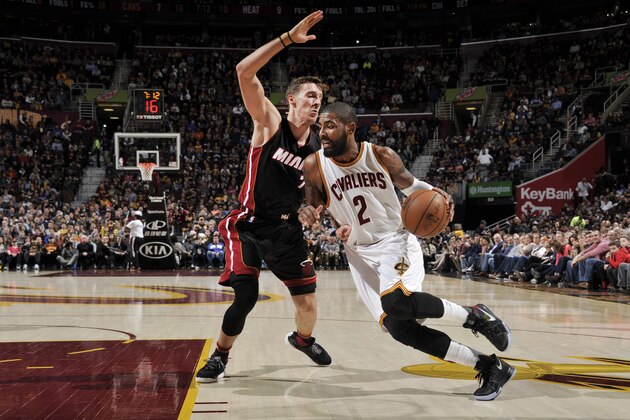 CLEVELAND, OH - MARCH 6:  Kyrie Irving #2 of the Cleveland Cavaliers drives to the basket against Goran Dragic #7 of the Miami Heat during a game on March 6, 2017 at Quicken Loans Arena in Cleveland, Ohio. NOTE TO USER: User expressly acknowledges and agrees that, by downloading and/or using this photograph, user is consenting to the terms and conditions of the Getty Images License Agreement. Mandatory Copyright Notice: Copyright 2017 NBAE (Photo by David Liam Kyle/NBAE via Getty Images)