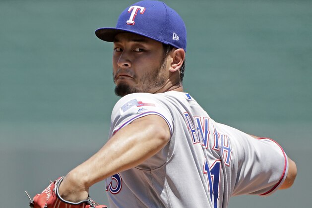 Texas Rangers starting pitcher Yu Darvish throws during the second inning of a baseball game against the Kansas City Royals, Sunday, July 16, 2017, in Kansas City, Mo. (AP Photo/Charlie Riedel)