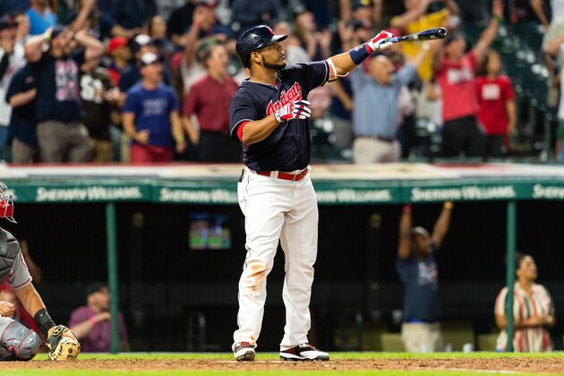 CLEVELAND, OH - JULY 25: Edwin Encarnacion #10 of the Cleveland Indians watches a walk-off grand slam home run clear the center field fence during the eleventh inning against the Los Angeles Angels of Anaheim at Progressive Field on July 25, 2017 in Cleveland, Ohio. The Indians defeated the Angels 11-7. (Photo by Jason Miller/Getty Images)