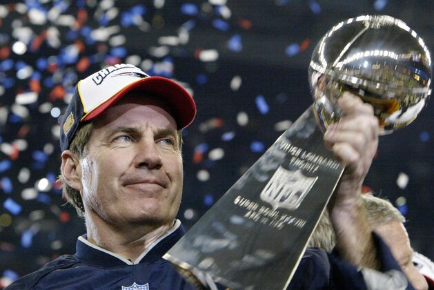 HOUSTON, UNITED STATES: Bill Belichick, head coach of the New England Patriots holds the Vince Lombardi trophy after winning Super Bowl XXXVIII, 01 February 2004 at Reliant Stadium in Houston, Texas. The Patriots beat the Carolina Panthers 32-29 to win the game. AFP PHOTO/Jeff HAYNES (Photo credit should read JEFF HAYNES/AFP/Getty Images) HOUSTON, UNITED STATES: Bill Belichick, head coach of the New England Patriots holds the Vince Lombardi trophy after winning Super Bowl XXXVIII, 01 February 2004 at Reliant Stadium in Houston, Texas. The Patriots beat the Carolina Panthers 32-29 to win the game. AFP PHOTO/Jeff HAYNES (Photo credit should read JEFF HAYNES/AFP/Getty Images)