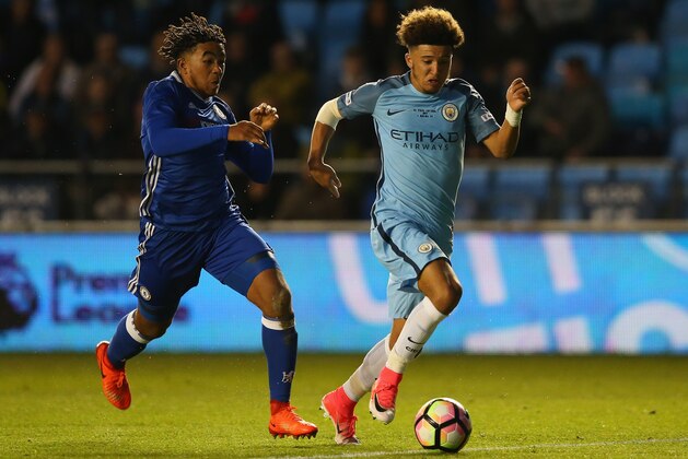 MANCHESTER, ENGLAND - APRIL 18: Jadon Sancho of Manchester City takes the ball past Reece James of Chelsea during the FA Youth Cup Final First Leg match between Manchester City and Chelsea at The Academy Stadium on April 18, 2017 in Manchester, England.  (Photo by Alex Livesey/Getty Images)