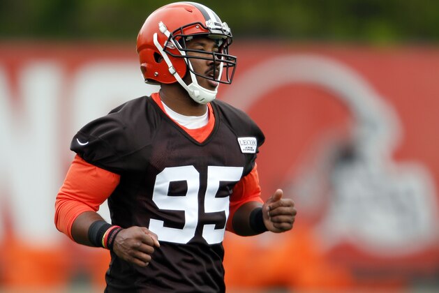 FILE - In this May 12, 2017 photo shows Cleveland Browns' Myles Garrett runs through drills during NFL football rookie minicamp in Berea, Ohio. Garrett has fully recovered from a foot sprain and is ready for training camp, the team announced Wednesday, July 26, 2017. Garrett, the No. 1 overall pick in this year's draft, suffered a left lateral foot sprain during minicamp in June.  (AP Photo/Ron Schwane, File)