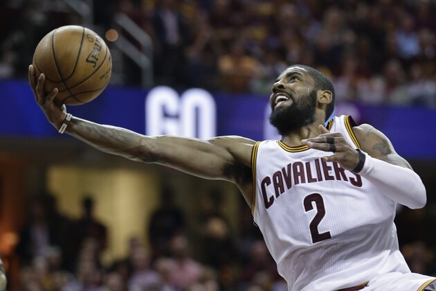 Cleveland Cavaliers' Kyrie Irving (2) puts up a shot against the Boston Celtics during the second half of Game 4 of the NBA basketball Eastern Conference finals, Tuesday, May 23, 2017, in Cleveland. (AP Photo/Tony Dejak)