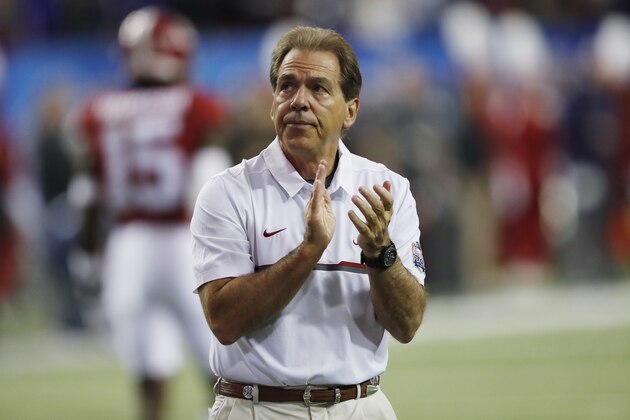 Alabama head coach Nick Saban walks the field before the first half of the Peach Bowl NCAA college football playoff game between Alabama and Washington, Saturday, Dec. 31, 2016, in Atlanta. (AP Photo/John Bazemore)