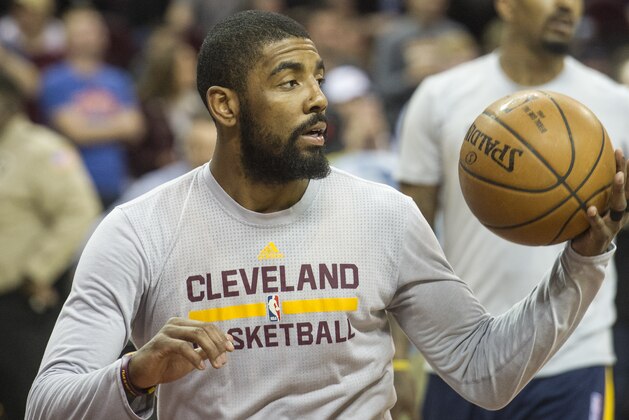 Cleveland Cavaliers' Kyrie Irving (2)warms up prior to an NBA basketball game against the Washington Wizards in Cleveland, Saturday, March 25, 2017. (AP Photo/Phil Long)