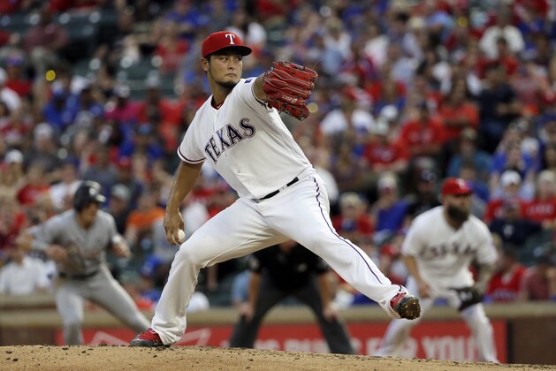 Texas Rangers' Yu Darvish of Japan throws to the Miami Marlins in the fourth inning of a baseball game, Wednesday, July 26, 2017, in Arlington, Texas. (AP Photo/Tony Gutierrez)