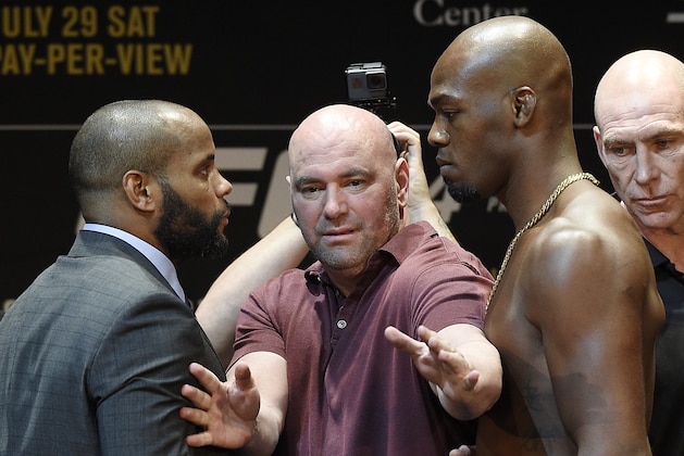 LOS ANGELES, CA - JULY 26: Dana White (C), UFC President, separates the two fighters Daniel Cormier (L) and Jon Jones during the UFC 214 Press Conference at The Novo by Microsoft July 26, 2017 in Los Angeles, California. (Photo by Kevork Djansezian/Zuffa LLC via Getty Images) LOS ANGELES, CA - JULY 26: Dana White (C), UFC President, separates the two fighters Daniel Cormier (L) and Jon Jones during the UFC 214 Press Conference at The Novo by Microsoft July 26, 2017 in Los Angeles, California. (Photo by Kevork Djansezian/Zuffa LLC via Getty Images)