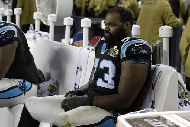 Carolina Panthers’ Michael Oher (73) watches from the bench during the second half of the NFL Super Bowl 50 football game Sunday, Feb. 7, 2016, in Santa Clara, Calif. (AP Photo/Marcio Jose Sanchez)
