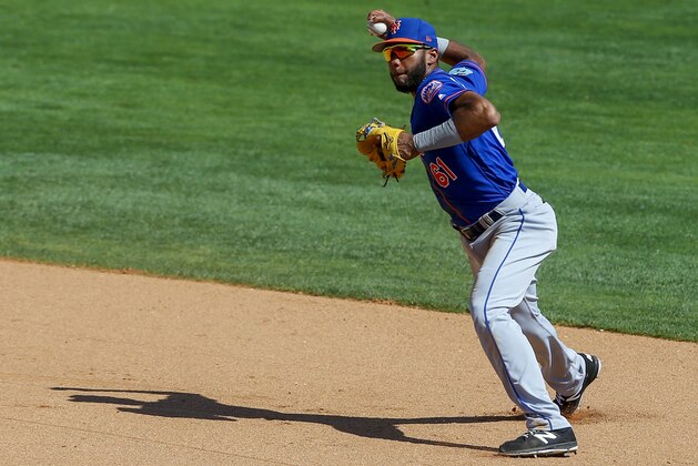 Mar 10, 2017; Lake Buena Vista, FL, USA; New York Mets shortstop Amed Rosario (61) throws to first for the out on a ground ball hit by Atlanta Braves' Nick Markakis (22) in the fifth inning of a baseball game during spring training at Champion Stadium. Mandatory Credit: Butch Dill-USA TODAY Sports