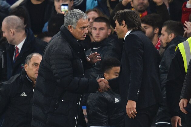 Manchester United's Portuguese manager Jose Mourinho (L) shakes hands with Chelsea's Italian head coach Antonio Conte (R) after the final whistle of the English Premier League football match between Chelsea and Manchester United at Stamford Bridge in London on October 23, 2016. / AFP / GLYN KIRK / RESTRICTED TO EDITORIAL USE. No use with unauthorized audio, video, data, fixture lists, club/league logos or 'live' services. Online in-match use limited to 75 images, no video emulation. No use in betting, games or single club/league/player publications.  /         (Photo credit should read GLYN KIRK/AFP/Getty Images)