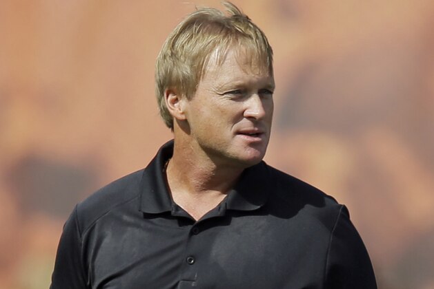 FILE - In this Aug. 15, 2014 file photo, Jon Gruden is shown at the Cleveland Browns training camp in Berea, Ohio. Serena Williams, Jon Gruden, Rob Manfred and Tim Finchem recognize the dangers of underfinanced youth sports across the nation. They are getting together for a star-studded panel discussion as they seek ways to provide funding for all sports for all youngsters. (AP Photo/Mark Duncan, File)