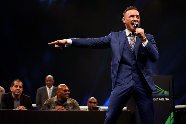 LONDON, ENGLAND - JULY 14:  Conor McGregor reacts to the crowd during the Floyd Mayweather Jr. v Conor McGregor World Press Tour event at SSE Arena on July 14, 2017 in London, England. (Photo by Jeff Bottari/Zuffa LLC/Zuffa LLC via Getty Images)