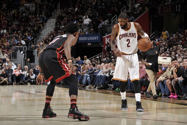 CLEVELAND, OH - MARCH 6:  Kyrie Irving #2 of the Cleveland Cavaliers handles the ball during a game against the Miami Heat on March 6, 2017 at Quicken Loans Arena in Cleveland, Ohio. NOTE TO USER: User expressly acknowledges and agrees that, by downloading and/or using this photograph, user is consenting to the terms and conditions of the Getty Images License Agreement. Mandatory Copyright Notice: Copyright 2017 NBAE (Photo by David Liam Kyle/NBAE via Getty Images)