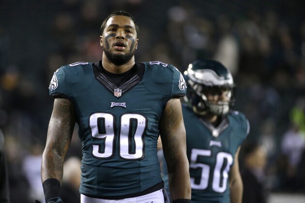 Philadelphia Eagles' Marcus Smith walks off the field during warm ups before an NFL football game against the Dallas Cowboys, Sunday, Dec. 14, 2014, in Philadelphia. (AP Photo/Michael Perez)
