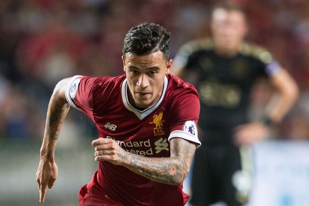 Liverpool's Philippe Coutinho controls the ball during the final of the Premier League Asia Trophy football tournament between Liverpool and Leicester City in Hong Kong on July 22, 2017. / AFP PHOTO / DALE DE LA REY / RESTRICTED TO EDITORIAL USE. No use with unauthorised audio, video, data, fixture lists, club/league logos or 'live' services. Online in-match use limited to 75 images, no video emulation. No use in betting, games or single club/league/player publications.        (Photo credit should read DALE DE LA REY/AFP/Getty Images)