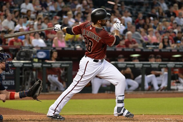 PHOENIX, AZ - JULY 26:  J.D. Martinez #28 of the Arizona Diamondbacks hits a two-run homer during the fourth inning of the MLB game against the Atlanta Braves at Chase Field on July 26, 2017 in Phoenix, Arizona.  (Photo by Jennifer Stewart/Getty Images)