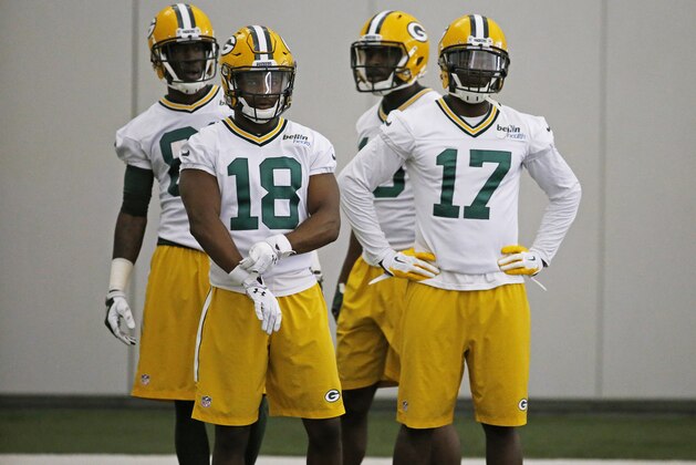 FILE - In this Monday, June 6, 2016 file photo, Green Bay Packers wide receiver Randall Cobb (18) and wide receiver Davante Adams (17) participate in drills during an NFL football practice in Green Bay, Wis. It’s a toss-up at receiver for the Green Bay Packers after Jordy Nelson and Randall Cobb. It’s a toss-up at receiver for the Green Bay Packers after Jordy Nelson and Randall Cobb. After Nelson and Cobb, the Packers have lots of options.  Jared Abbrederis and Davante Adams are both entering their third seasons, while Ty Montgomery is going into his second year. (AP Photo/Matt Ludtke, File)