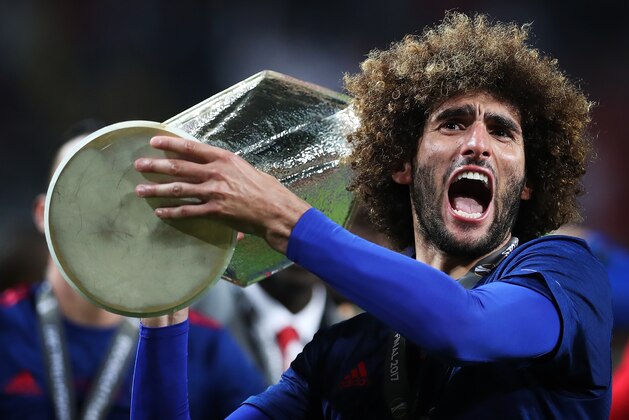 STOCKHOLM, SWEDEN - MAY 24: Marouane Fellaini of Manchester United lifts the trophy during the UEFA Europa League Final match between Ajax and Manchester United at Friends Arena on May 24, 2017 in Stockholm, Sweden. (Photo by Ian MacNicol/Getty Images)