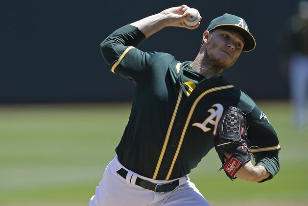 Oakland Athletics pitcher Sonny Gray works against the Tampa Bay Rays in the first inning of a baseball game Wednesday, July 19, 2017, in Oakland, Calif. (AP Photo/Ben Margot)