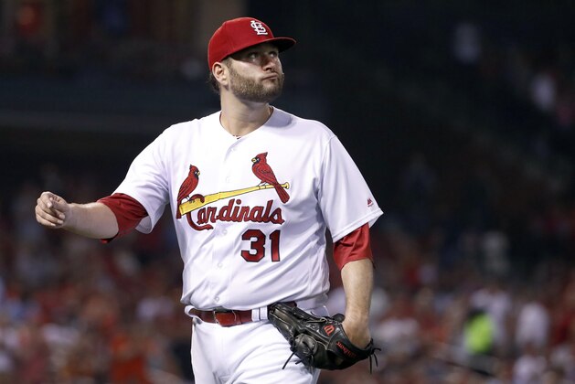 St. Louis Cardinals starting pitcher Lance Lynn walks off the field after being removed during the seventh inning of the team's baseball game against the Colorado Rockies on Tuesday, July 25, 2017, in St. Louis. (AP Photo/Jeff Roberson)