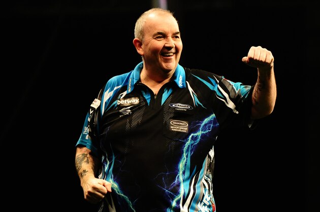 EXETER, UNITED KINGDOM - MARCH 02: Phil Taylor celebrates during Night Five of the Betway Premier League Darts at Westpoint Arena on March 2, 2017 in Exeter, England. (Photo by Harry Trump/Getty Images)