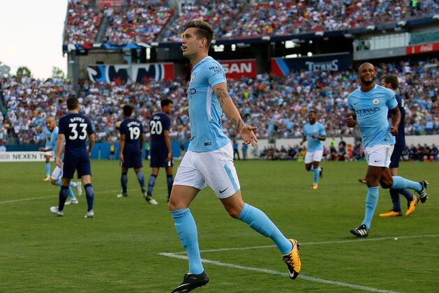 NASHVILLE, TN - JULY 29:  John Stones #5 of Manchester City celebrates after scoring a goal against Tottenham during the first half of the 2017 International Champions Cup Presented by Heineken at Nissan Stadium on July 29, 2017 in Nashville, Tennessee.  (Photo by Frederick Breedon/Getty Images)