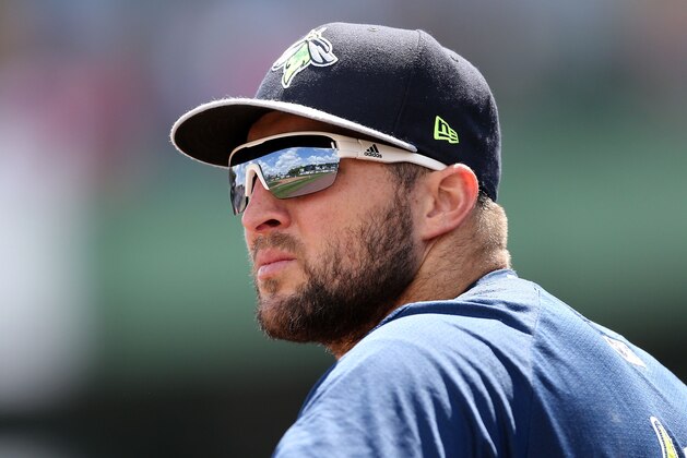 LAKEWOOD, NJ - MAY 14: Tim Tebow #15 of the Columbia Fireflies watches the game action in the top of the fourth inning against the Lakewood BlueClaws on May 14, 2017 at FirstEnergy Park in Lakewood, New Jersey. (Photo by Christopher Pasatieri/Getty Images) LAKEWOOD, NJ - MAY 14: Tim Tebow #15 of the Columbia Fireflies watches the game action in the top of the fourth inning against the Lakewood BlueClaws on May 14, 2017 at FirstEnergy Park in Lakewood, New Jersey. (Photo by Christopher Pasatieri/Getty Images)