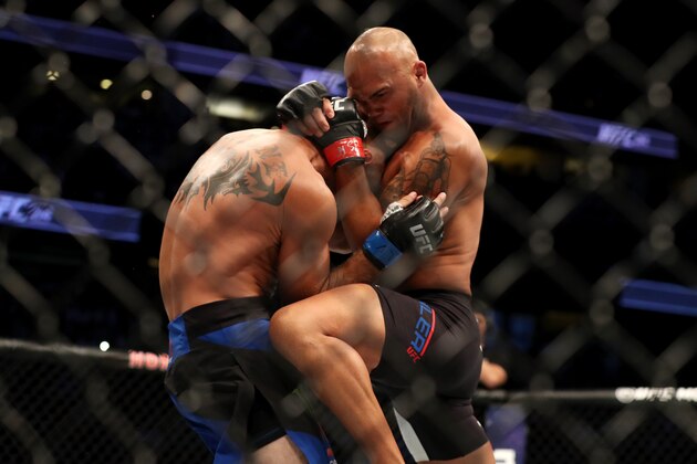 ANAHEIM, CA - JULY 29:  Robbie Lawler knees Donald Cerrone in their welterweight bout during the UFC 214 event at Honda Center on July 29, 2017 in Anaheim, California.  (Photo by Christian Petersen/Zuffa LLC/Zuffa LLC via Getty Images)
