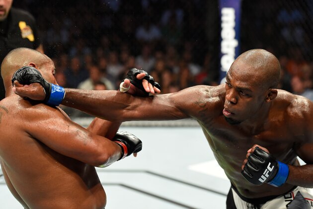 ANAHEIM, CA - JULY 29:  (R-L) Jon Jones punches Daniel Cormier in their UFC light heavyweight championship bout during the UFC 214 event at Honda Center on July 29, 2017 in Anaheim, California.  (Photo by Josh Hedges/Zuffa LLC/Zuffa LLC via Getty Images)