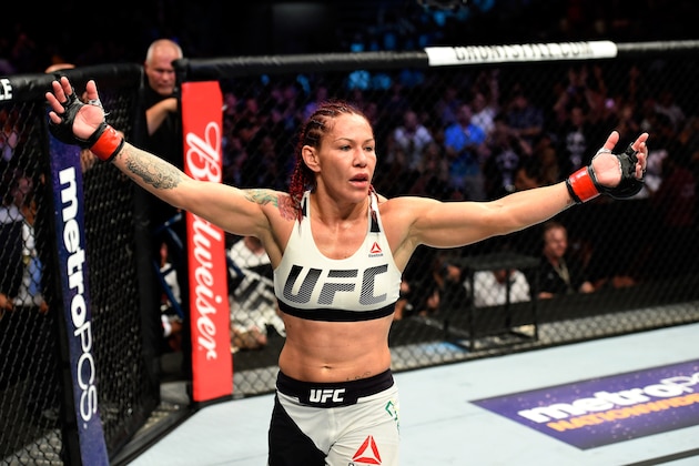 ANAHEIM, CA - JULY 29:  Cris Cyborg of Brazil reacts after defeating Tonya Evinger by TKO in their UFC women's featherweight championship bout during the UFC 214 event at Honda Center on July 29, 2017 in Anaheim, California.  (Photo by Josh Hedges/Zuffa LLC/Zuffa LLC via Getty Images)