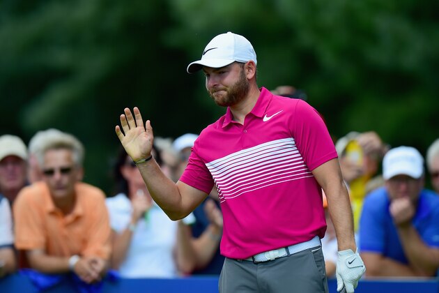 HAMBURG, GERMANY - JULY 30:  Jordan Smith of England acknowledges the applause from the crowd on the 1st tee during the Porsche European Open - Day Four at Green Eagle Golf Course on July 30, 2017 in Hamburg, Germany.  (Photo by Tony Marshall/Getty Images)