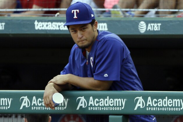 Texas Rangers' Yu Darvish, of Japan, leans on the dugout rail during the first inning of a baseball game against the Baltimore Orioles, Friday, July 28, 2017, in Arlington, Texas. (AP Photo/Tony Gutierrez)