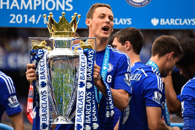 LONDON, ENGLAND - MAY 24:  Nemanja Matic of Chelsea celebrates with the trophy after the Barclays Premier League match between Chelsea and Sunderland at Stamford Bridge on May 24, 2015 in London, England. Chelsea were crowned Premier League champions.  (Photo by Mike Hewitt/Getty Images)