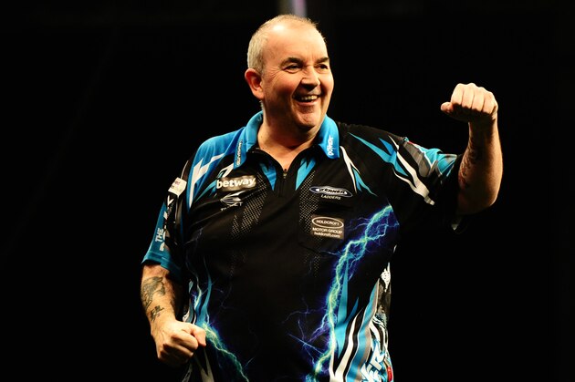 EXETER, UNITED KINGDOM - MARCH 02: Phil Taylor celebrates during Night Five of the Betway Premier League Darts at Westpoint Arena on March 2, 2017 in Exeter, England. (Photo by Harry Trump/Getty Images)