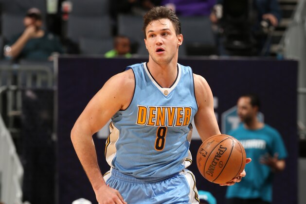 CHARLOTTE, NC - MARCH 31: Danilo Gallinari #8 of the Denver Nuggets handles the ball against the Charlotte Hornets on March 31, 2017 at Spectrum Center in Charlotte, North Carolina. NOTE TO USER: User expressly acknowledges and agrees that, by downloading and or using this photograph, User is consenting to the terms and conditions of the Getty Images License Agreement.  Mandatory Copyright Notice:  Copyright 2017 NBAE (Photo by Kent Smith/NBAE via Getty Images)