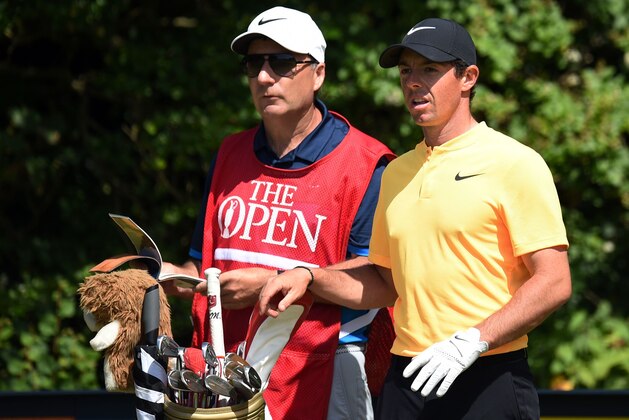 Northern Ireland's Rory McIlroy and caddie JP Fitzgerald wait on the 5th tee during his final round on day four of the 2017 Open Golf Championship at Royal Birkdale golf course near Southport in north west England on July 23, 2017. / AFP PHOTO / Oli SCARFF / RESTRICTED TO EDITORIAL USE        (Photo credit should read OLI SCARFF/AFP/Getty Images)