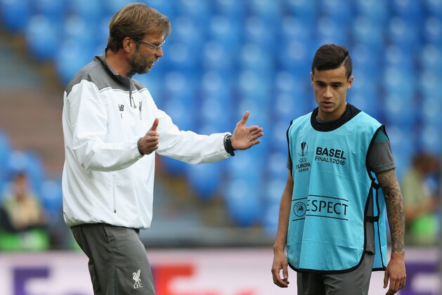 BASEL, SWITZERLAND - MAY 17:  Jurgen Klopp, manager of Liverpool talks with Philippe Coutinho during a Liverpool training session on the eve of the UEFA Europa League Final against Sevilla at St. Jakob-Park on May 17, 2016 in Basel, Switzerland.  (Photo by Lars Baron/Getty Images)