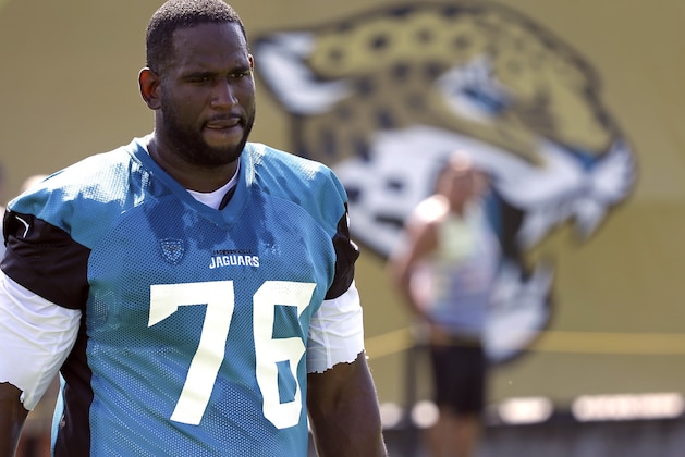 Jacksonville Jaguars offensive lineman Branden Albert (76) arrives at practice during NFL football training camp, Friday, July 28, 2017, in Jacksonville, Fla. (AP Photo/John Raoux)