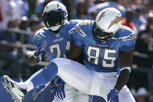 San Diego Chargers' Antonio Gates, right, and LaDainian Tomlinson celebrate Tomlinson's 27 yard touchdown run in the first quarter of an NFL football game against the Oakland Raiders  Sunday, Oct. 14, 2007 in San Diego.  (AP Photo/Lenny Ignelzi)