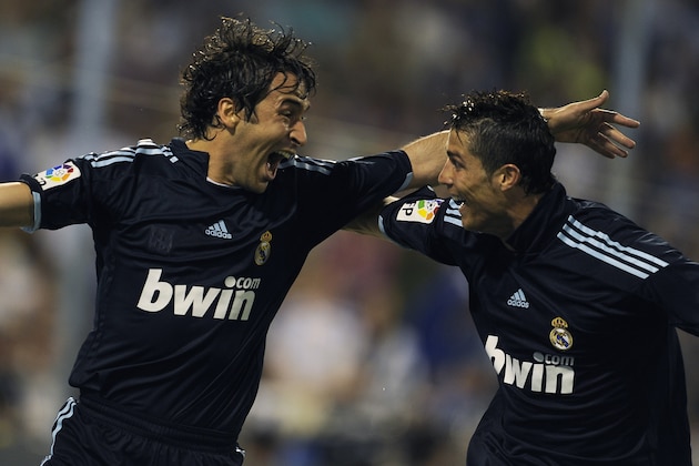 Real Madrid's Raul Gonzalez ( L ) celebrates his goal with teammate Portuguese forward Cristiano Ronaldo  against Zaragoza during their Spanish League football match at Romareda  stadium in Zaragoza  on April 24, 2010. AFP PHOTO / DANI POZO (Photo credit should read Dani Pozo/AFP/Getty Images)