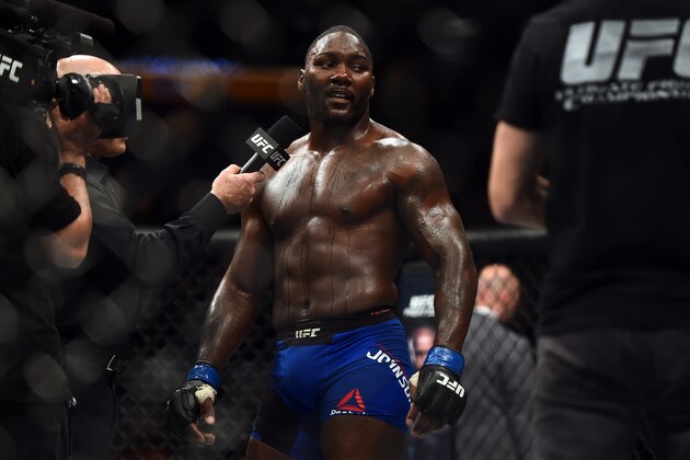 BUFFALO, NY - APRIL 08:  Anthony Johnson speaks to Joe Rogan after being defeated by Daniel Cormier in their UFC light heavyweight championship bout during the UFC 210 event at the KeyBank Center on April 8, 2017 in Buffalo, New York. (Photo by Jeff Bottari/Zuffa LLC/Zuffa LLC via Getty Images)