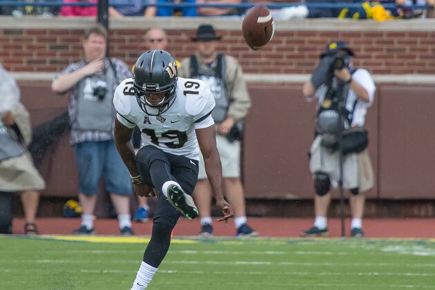 DETROIT, MI - SEPTEMBER 10: Place kicker Donald De La Haye #19 of the UCF Knights kicks off after a touchdown during a college football game against the Michigan Wolverines at Michigan Stadium on September 10, 2016 in Ann Arbor, Michigan. The Wolverines defeated the UCF Knights 51-14. (Photo by Dave Reginek/Getty Images)