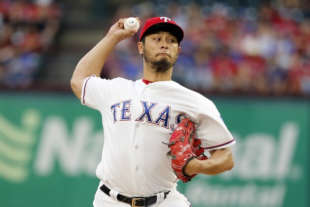 Texas Rangers' Yu Darvish of Japan throws to the Philadelphia Phillies in the first inning of a baseball game, Tuesday, May 16, 2017, in Arlington, Texas. (AP Photo/Tony Gutierrez)